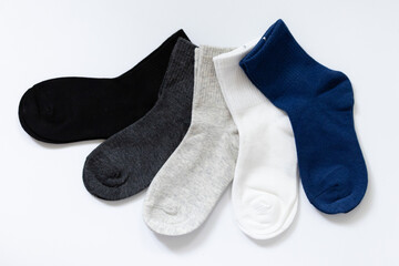 5 Pairs of Baby Socks Blue, Black, Grey, White on White Background