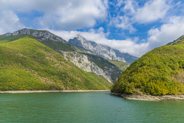 Fototapeta premium The Komani Lake reservoir of the Drin River in the Albanian Alps.