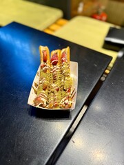 Churros take away street dessert with fruits