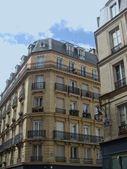  Paris, March 2025 : Visit of the magnificent city of Paris, Capital of France - View on different facades of buildings built by Baron Haussmann