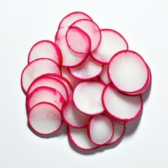 A pile of sliced radishes with pink edges on a white background surface