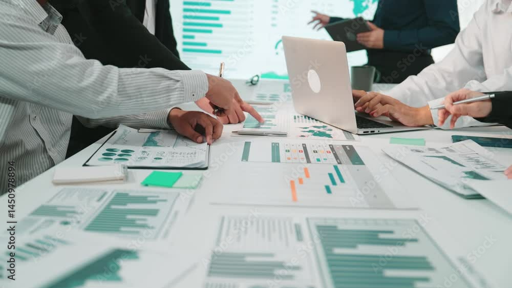 Aufkleber a dynamic business team engages in data analysis and strategy planning in a modern office. they disc