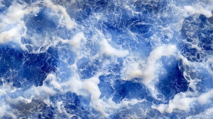 Fototapeta premium A breathtaking sight unfolds where tranquil blue waters converge with turbulent dark blue ones, forming two distinct realms