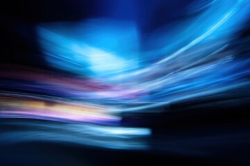 Abstract blue and black waves create a dynamic, vibrant motion effect.