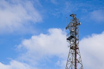 Tall maritime surveillance radar tower monitoring coastal zones, detecting unauthorized vessel...