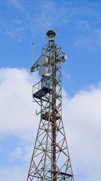 Coastal radar tower standing vigilant, monitoring maritime zones and intercepting potential unauthorized marine operations