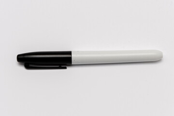 A plain black marker for writing and drawing, isolated on a white background.
