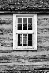 Old weathered wood barn wall, door and window