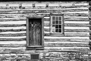 Old weathered wood barn wall, door and window