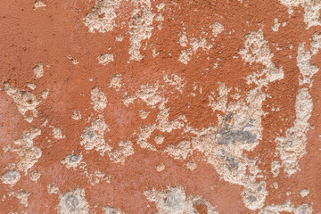 Weathered Red Wall with Peeling Texture