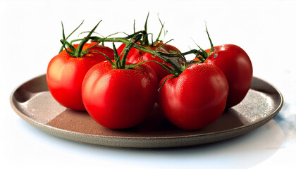 a plate of red tomatoes with stems on it