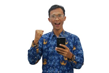 An Asian man wearing an Indonesian civil servant uniform holding a smartphone showing a happy...
