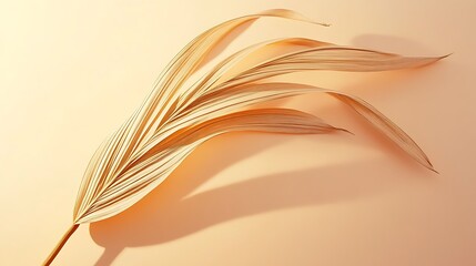 Elegant, dried palm frond against a soft pastel background.