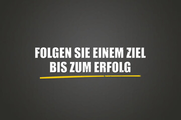 Folgen Sie einem Ziel bis zum Erfolg (Follow a goal until success) - A blackboard with white text.