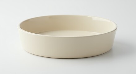 Cream colored round bowl isolated on white background