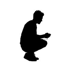 Solid black silhouette of a gamer playing, vector EPS