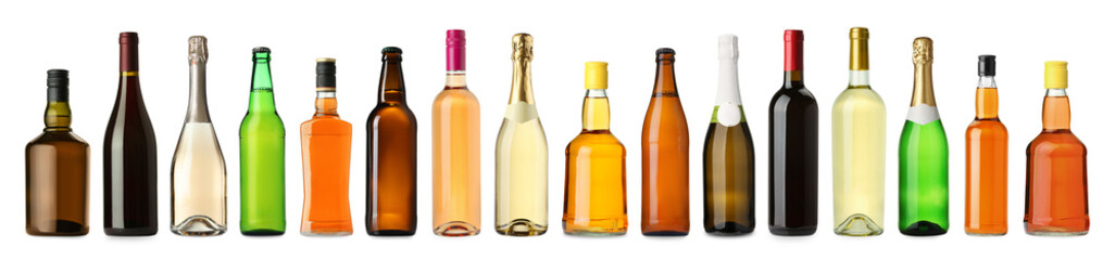 Bottles with different types of alcoholic drinks isolated on white, set