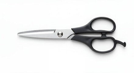 Scissors against plain background