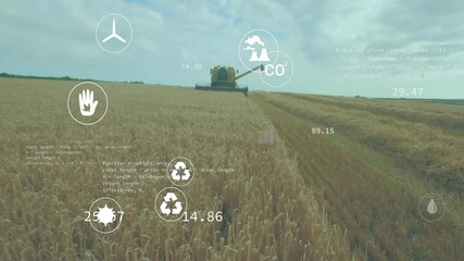 Combine harvester moving through golden wheat field, displaying digital CO? icons and data overlays - Powered by Adobe