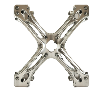 A silver metal piece with four legs and a square cross section