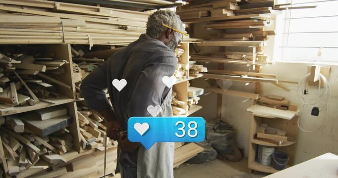man standing in woodshop, showcasing wooden planks with animated hearts and blue like counter