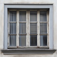 Fototapeta premium Aged, weathered window on a light gray building