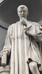 Florence, Italy - 3 January 2025. Close-up of Machiavelli’s statue with a thoughtful expression,...
