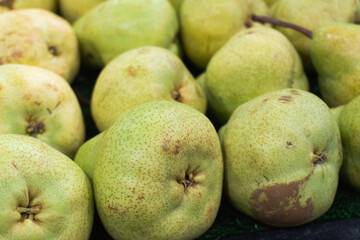 Fresh green pears sold in supermarket.