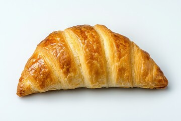 Freshly baked golden croissant on a clean white background, perfect for food photography