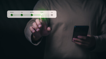 Man shows management progress in the mobile interface to emphasize effective planning, data tracking, and workflow success.