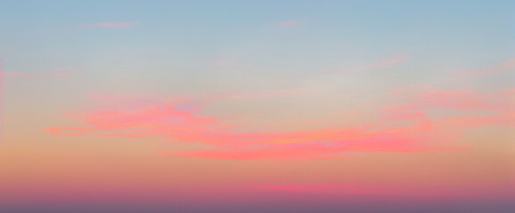 Obraz premium Sky with pastel colors pink orange purple and blue during sunset or sunrise. luxurious premium sunset and sunrise photo collection for background