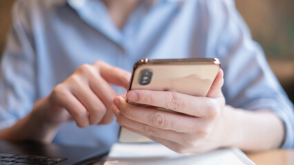 Close-up business hand holding using smartphone technology communication modern lifestyle concept