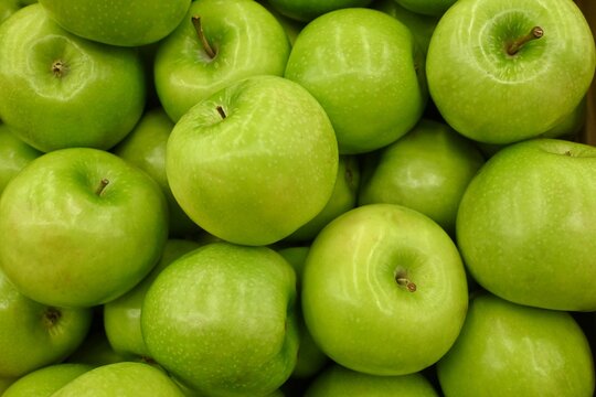 Green apples, full frame, background.