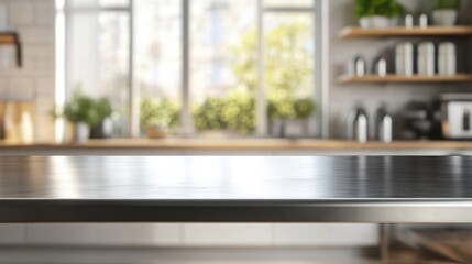 Empty stainless tabletop with blurred kitchen view background.