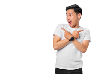Shocked young Asian man crossed arms and points sideways, chooses between two options, indicates left and right isolated on transparent background