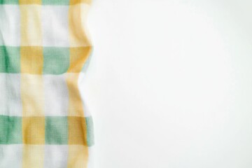 Checkered cloth napkin on white background