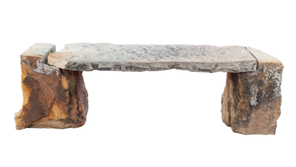 Side view of chaise lounge made from stones. Two large stone legs and a long, large stone slab for sitting on.