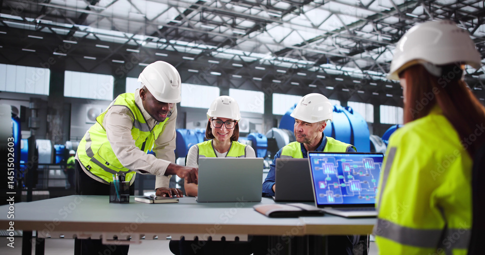 Poster skilled technician and young engineer monitor automated powerplant operations
