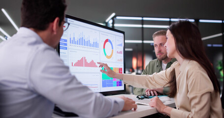 Fototapeta na wymiar Businesswoman Managing Company Data Using Analytics Dashboard