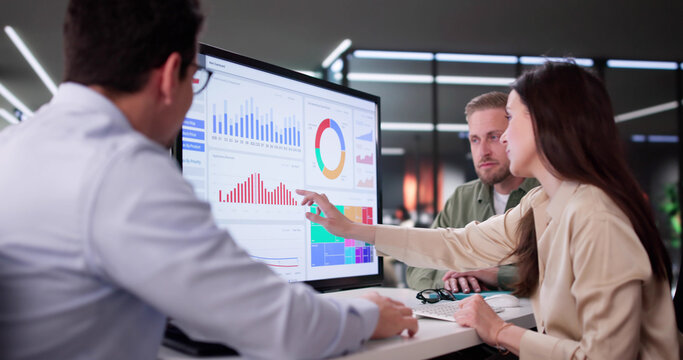 Businesswoman Managing Company Data Using Analytics Dashboard