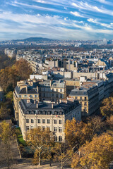 Naklejka na ściany i meble Paris, beautiful Haussmann facades and roofs in a luxury area of the capital, view from the triumph arch 