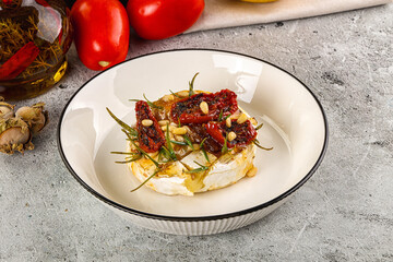 Baked camembert cheese with honey
