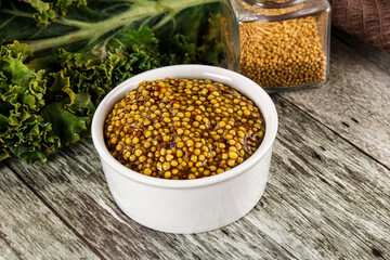 Mustard sauce with seeds in the bowl