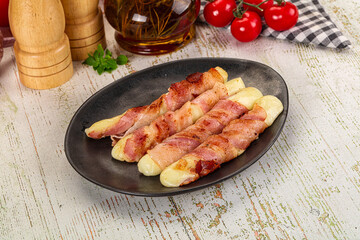 Hot mozzarella sticks with bacon