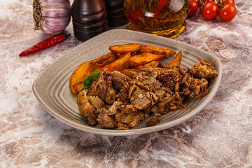 Baked shredded pork with potato
