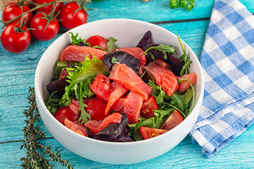 Salad with salmon and arugula