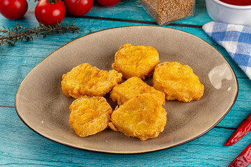 Golden crispy fried chicken nuggets