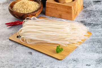 Raw dry pho noodles for cooking