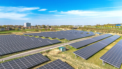 Aerial drone view of solar panels farm, solar power for green sustainable renewable energy concept, photovoltaic power station or solar park in the Netherlands