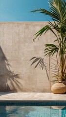 Tropical summer background with concrete wall, pool water and palm leaf shadow. Luxury hotel resort exterior for product placement. Outdoor vacation holiday house scene, neutral architecture aesthetic